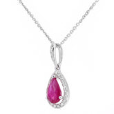 0.62ct Pear Shape Ruby and Micro Set Diamond Pendant in UK Hallmarked 9ct White Gold